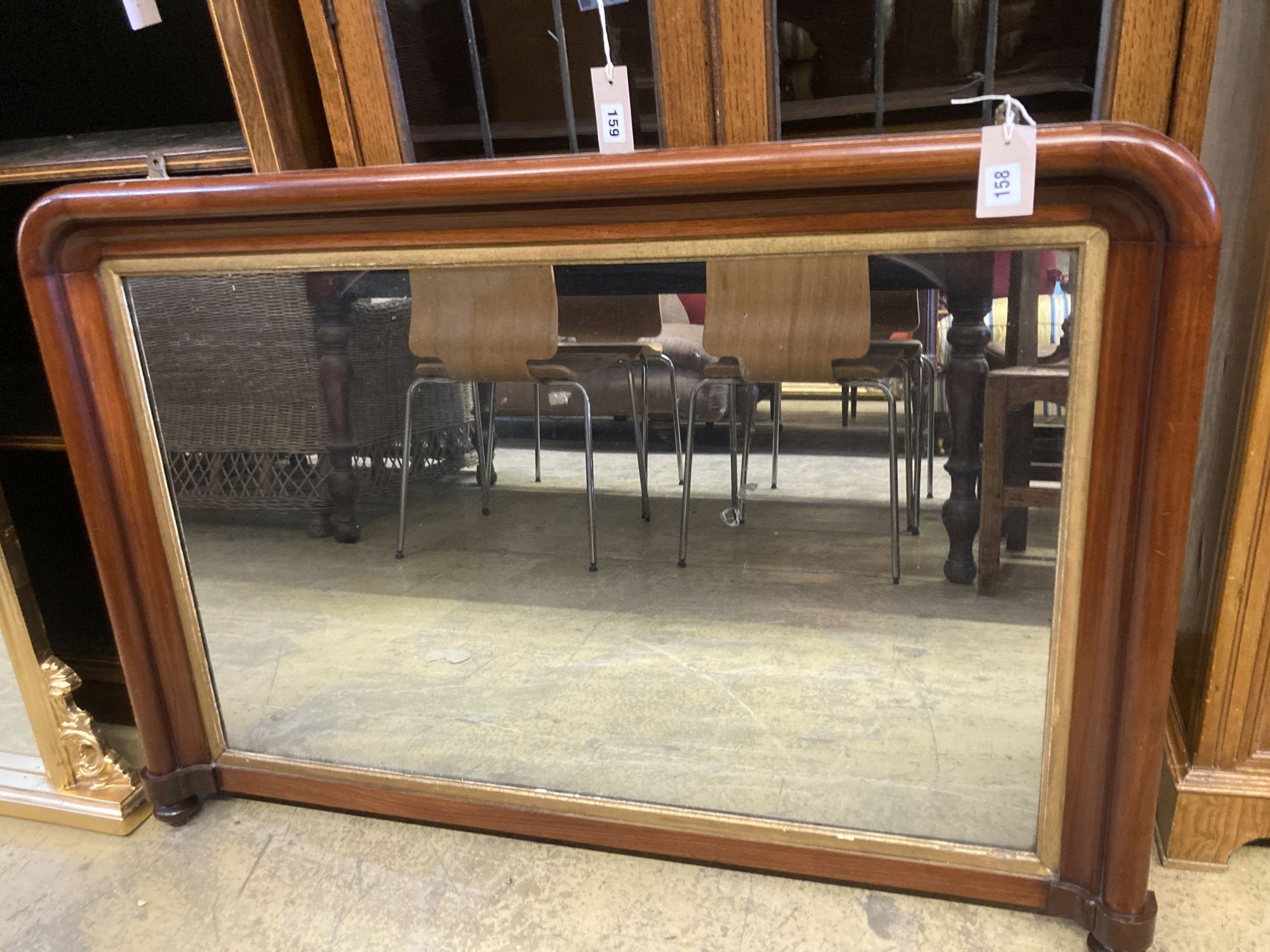 A Victorian mahogany overmantel mirror, width 102cm, height 71cm, together with a reproduction gilt framed overmantel mirror